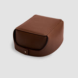Brown leather valet tray viewed from the side, highlighting its minimalist design