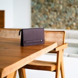 Leather travel pouch in lux interior that's showing a Italian full grain leather