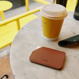 Brown Card Slider in minimalist style with other key accessories