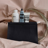 Minimalist leather dopp kit. Leather toiletry bag for men. Black color.