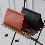 Minimalist leather dopp kit. Leather toiletry bag for men. Black color.