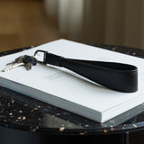 Black Leather Long Keyring on the Desk