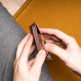 Card Holder wallet in brown leather in use