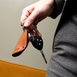 Key Fob with car key in brown leather assembled