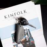 Minimalist key cord fob beside credit card and house key for scale