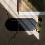 Black leather pad for small accessories