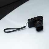 Leather camera strap. Simple and elegant strap for small and medium-sized cameras.