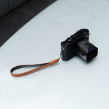Leather camera strap. Simple and elegant strap for small and medium-sized cameras.
