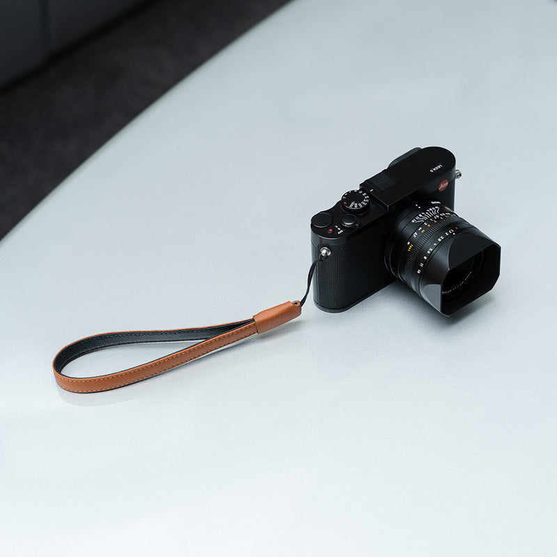 Leather camera strap. Simple and elegant strap for small and medium-sized cameras.