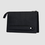 Black leather wallet with a silver zipper on a light gray background