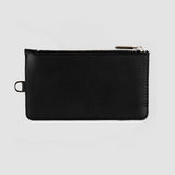 Black leather pouch with zipper on a light gray background