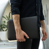 Black Leather MacBook Sleeve in Hands 2