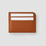 A uniquely constructed cardholder that easily handles bills through a side-opening, and five card slots for the essentials.