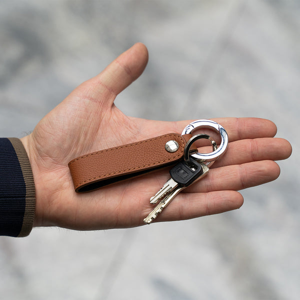 Brown Leather Keyring in Hands