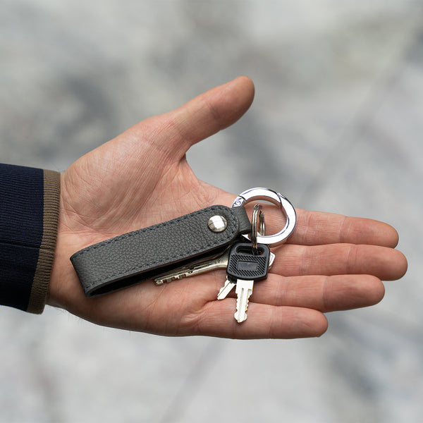 Grey Leather Keyring in Hands