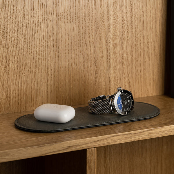 Grey Leather Pad with Accessories on the Shelf