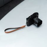 Leather camera strap. Simple and elegant strap for small and medium-sized cameras.