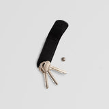 Leather key organizer in grey color - how it works